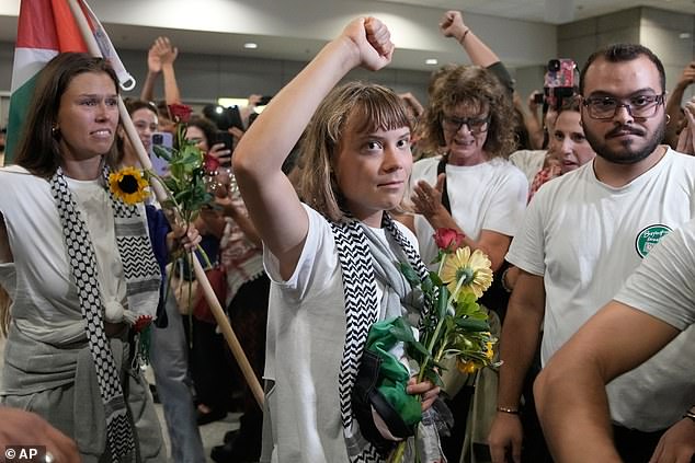 Greta Thunberg was met by cheering crowds of supporters as she arrived in Athens on Monday