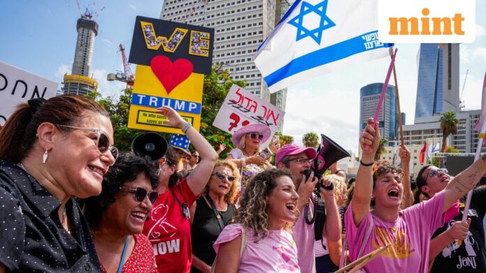 ‘Nobel Prize to Trump’: Crowds in Gaza, Tel Aviv hail People celebrate at Hostage Square in Tel Aviv on October 9, 2025, following the announcement of the new Gaza ceasefire deal. (Photo by MAYA LEVIN / AFP)