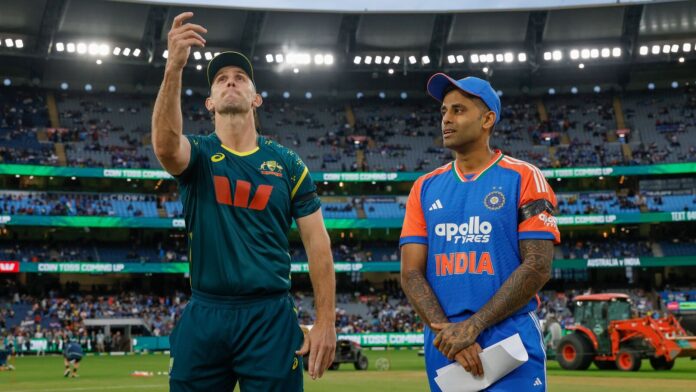 ‘Puja karni paregi’ - Suryakumar Yadav's hilarious reaction goes viral India captain Suryakumar Yadav (R) looks on as Australia's Mitchell Marsh toss the coin at MCG.