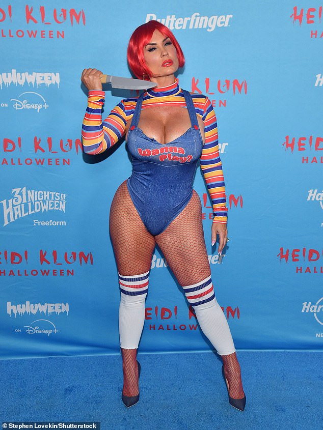 TV personality and Ice-T's wife, Coco Austin, came dressed as as sexy Chucky doll. She leaned all the way into it as she held a fake knife against her neck, and wore a bright red wig