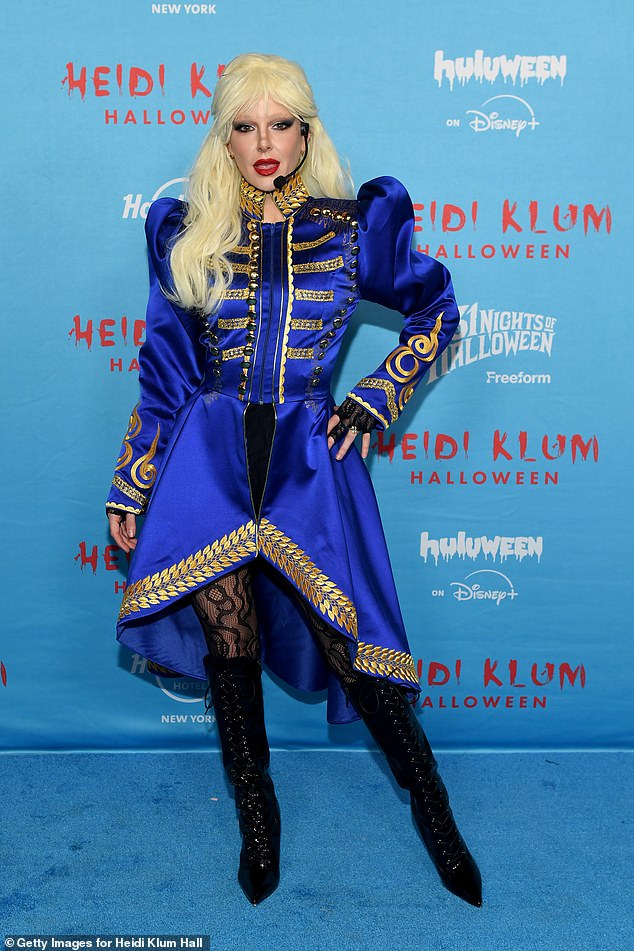 Love Island USA host Ariana Madix dressed as Lady Gaga for the party, channeling the same look she had when she performed 'Zombieboy' at last year's Coachella Festival. Madix wore a dramatic blonde wig with bangs, and a royal blue dress with gold detailing and puff sleeves. She topped off the look with a pair of lace tights and even had a headset on