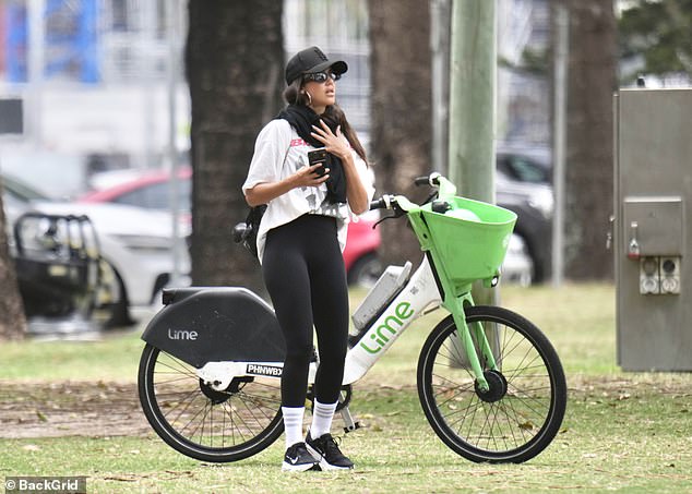 Jessica kept a low profile in a black cap and sunglasses as she explored the area on the rental bike