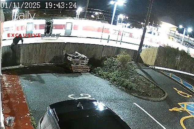 Our exclusive footage shows a man carrying a blade while walking through a car park next to Huntingdon rail station in Cambridgeshire following Saturday night's train stabbings
