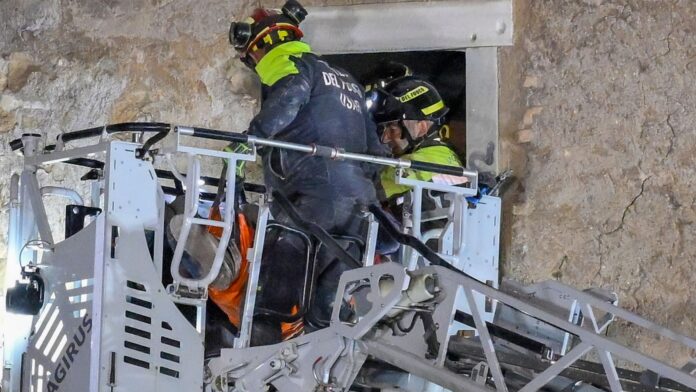 Worker rescued after medieval tower partly collapses in Rome Worker rescued after medieval tower partly collapses in Rome