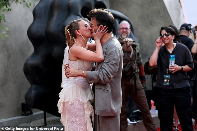 The openly-gay star also sent tongues wagging earlier this year as he shared multiple kisses with his Jurassic World Rebirth co-star Johansson, 40 (seen in New York in June)