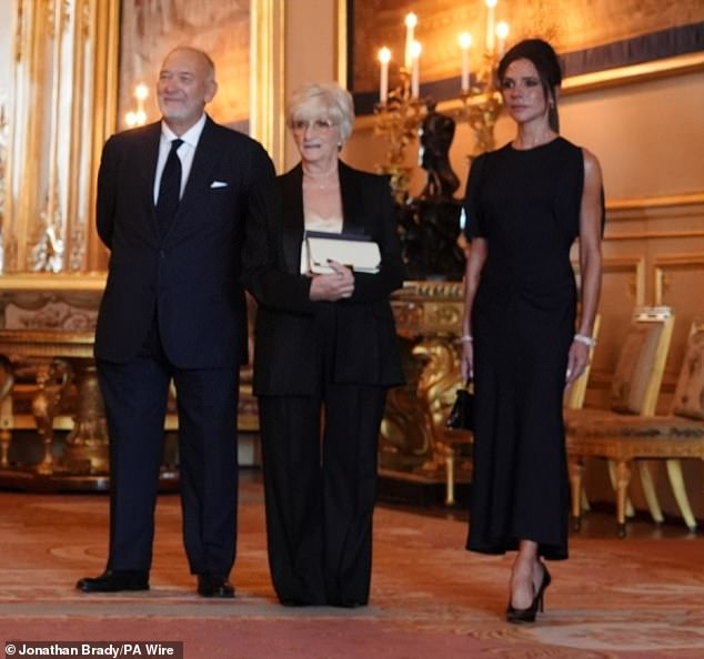 Sir David's wife Victoria and parents Ted and Sandra were present as the legendary former footballer received the honour