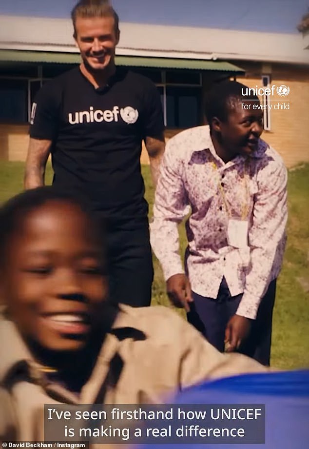 Others showed a beaming Sir David watching as children ran around and played sport