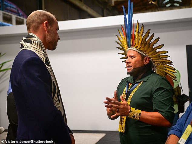 Kleber Karipuna (right), Executive Coordinator of Articulation of Indigenous Peoples of Brazil (APIB), speaks with Prince William during the United for Wildlife Summit