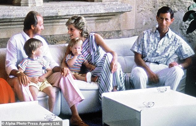Juan Carlos was close to the British royal family. Above: Carlos with Prince William on his lap as he chats to Princess Diana during a royal visit to Majorca in 1986