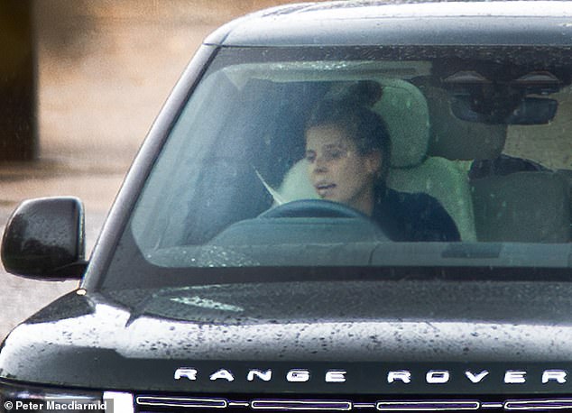 Princess Beatrice drives from Royal Lodge, home of her father Prince Andrew and mother Sarah Ferguson, at Windsor in Berkshire on October 20
