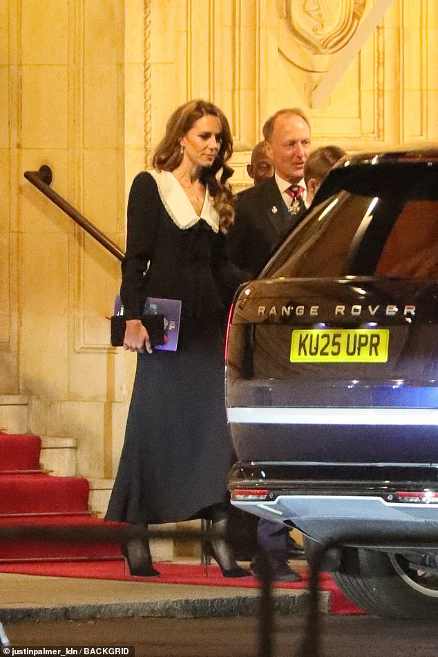 The Princess of Wales holds the programme for the Remembrance Festival
