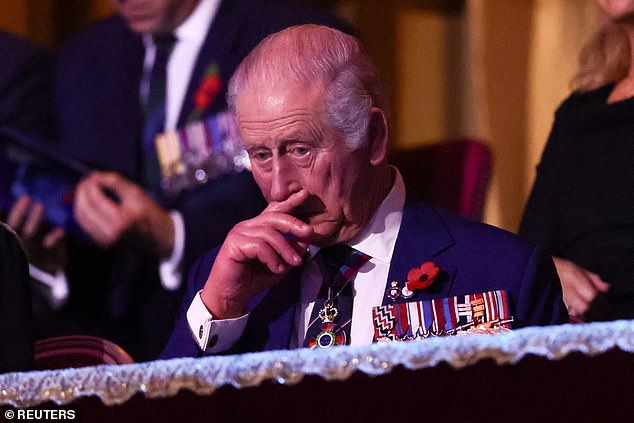 The monarch, who was diagnosed with cancer in 2024, looks moved as he watches the stage