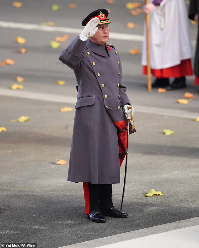 King Charles stared solemnly as he saluted in front of the Cenotaph to mark Remembrance Day