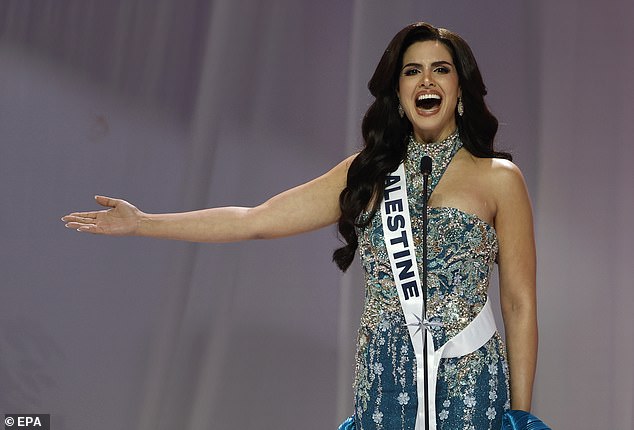 Nadeen Ayoub is the first ever Miss Palestine to participate in the 2025 Miss Universe contest. She is pictured here presenting onstage during the Miss Universe 2025 welcome event in Bangkok on November 5