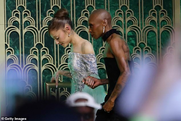 Cynthia was seen holding Ariana's hand on the same day