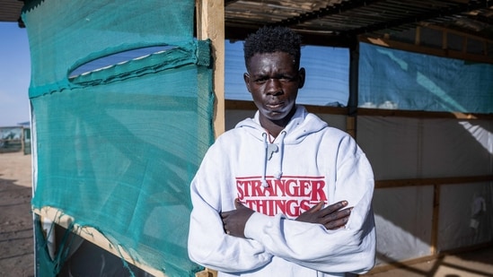 Mounir Abderahmane, 16, poses for a photograph at the Doctors Without Borders (MSF) clinic in the Tine transit camp in Chad.(AFP) Mounir Abderahmane, 16, poses for a photograph at the Doctors Without Borders (MSF) clinic in the Tine transit camp in Chad.(AFP)