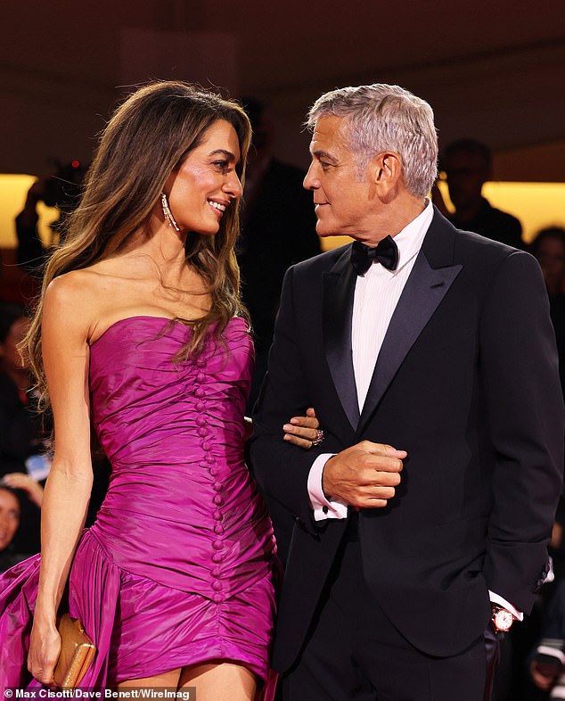 Clooney, with husband George, 64, at the Venice Film festival premiere of his film, Jay Kelly, in August. The actress was said to have undergone a 'non-surgical' facelift before the event
