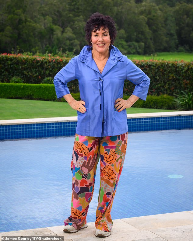 Ruby Wax, 72, wore a bright blue shirt and patterned trousers