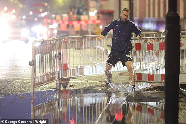 Flooding during heavy rain in the Euston area of London this morning as Storm Claudia hits