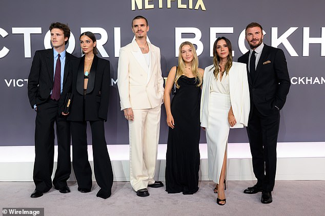 Brooklyn has since also failed to share his support for Victoria's recent Netflix documentary (pictured at the premiere) or David's knighthood