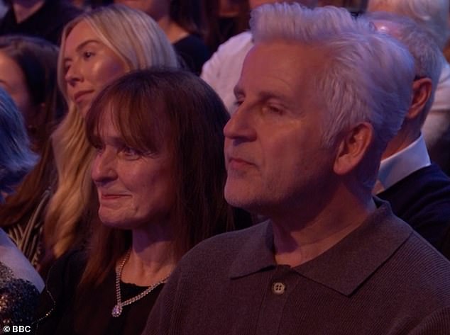 Overcome with emotion George was watched from the audience by his mum and dad as he described the routine as a 'love letter' to his family