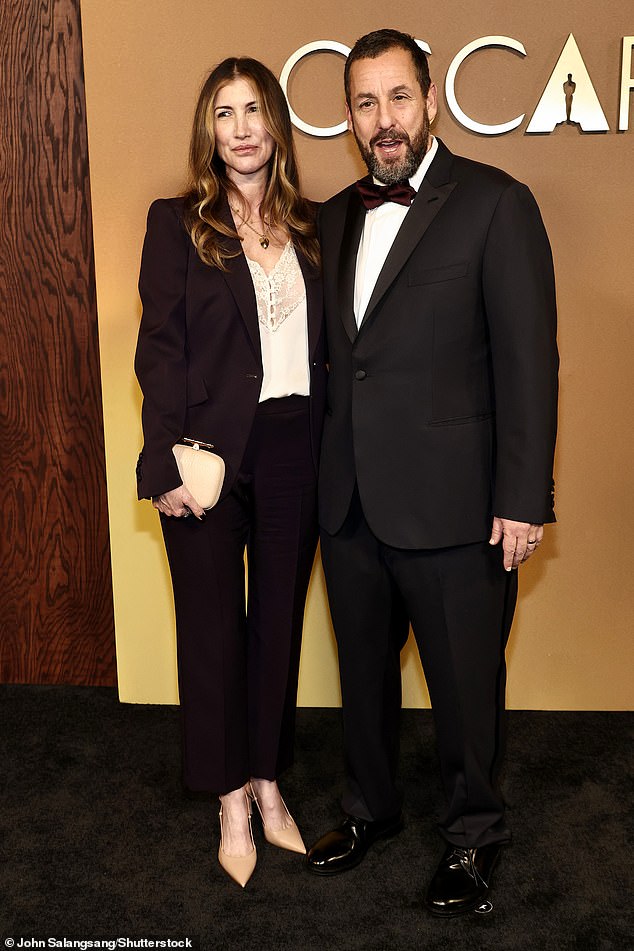 Adam Sandler, 59, made the rare move of wearing a suit as he posed with his wife Jackie Sandler, 51