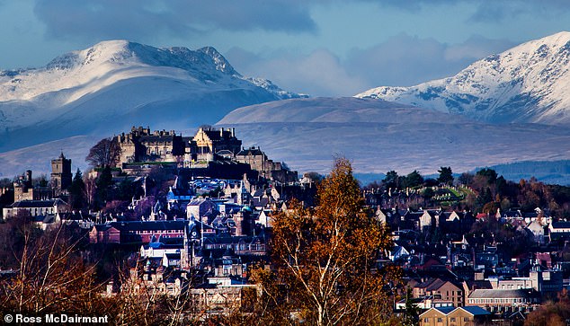 STERLING, NOVEMBER 14: Snowfall on top of the hills behind Stirling Castle as an icy Arctic blast moves in