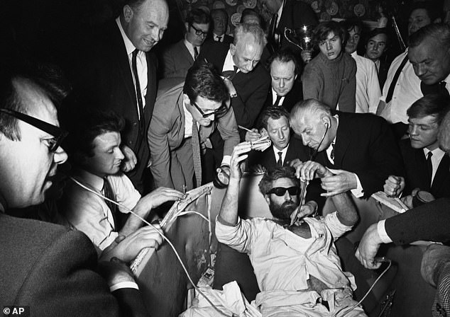 Emerging in sunglasses, beard thick and confidence intact, Meaney declared: 'I'd like to go for a hundred days more. I'm delighted to be the champion of the world'