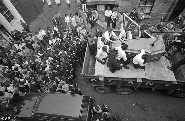 On February 21, supporters and TV crews lined the streets of Kilburn, the centre of London 's Irish community, as a coffin measuring just 6ft 3in by 2ft 6in was paraded like a celebrity