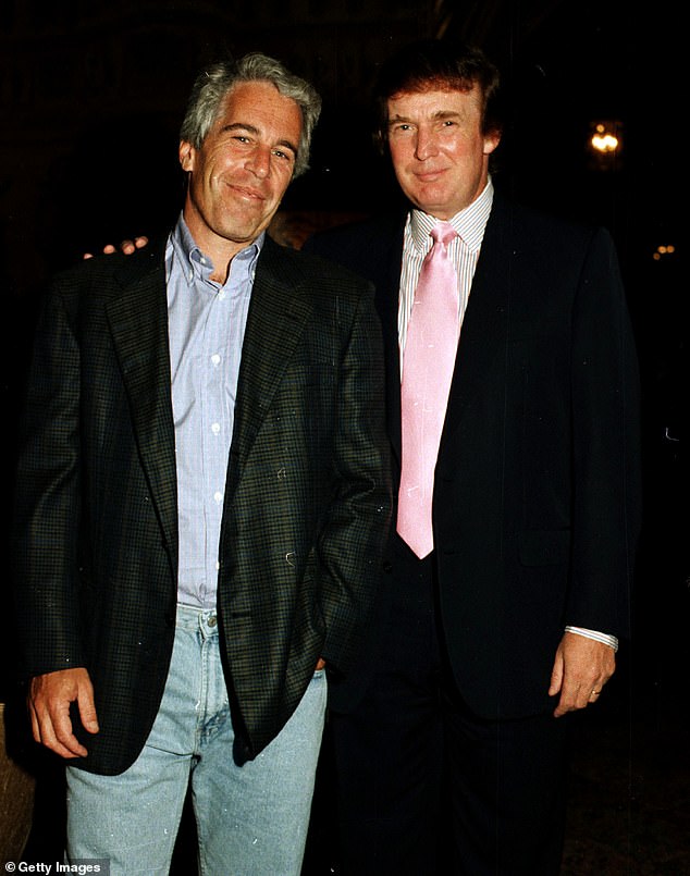 Portrait of American financier Jeffrey Epstein (left) and real estate developer Donald Trump as they pose together at the Mar-a-Lago estate, Palm Beach, Florida on February 22, 1997. (Photo by Davidoff Studios/Getty Images)