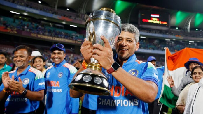 Amol Muzumdar - Mumbai cricket's uncapped maestro stands tall for India women's head coach Amol Muzumdar celebrates with the World Cup trophy on Sunday night.