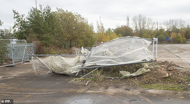 Old Portaloos, piles of construction supplies and stacks of unused fences were all that could be said for progress