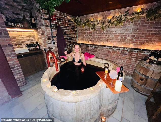 I tried wine bath 'therapy' at the spa loved by Daily Mail's Sadie Whitelocks tried out a vinotherapy treatment at the Aire Ancient Baths in New York to test out the healing properties of red wine grapes