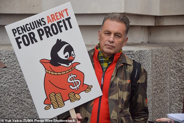 Conservationist and TV presenter Chris Packham takes part in a protest against the enclosure which holds the 15 gentoo penguins on October 19, 2025