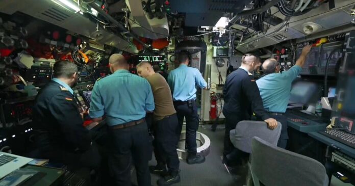 Onboard a NATO sub for military exercise monitoring Russia