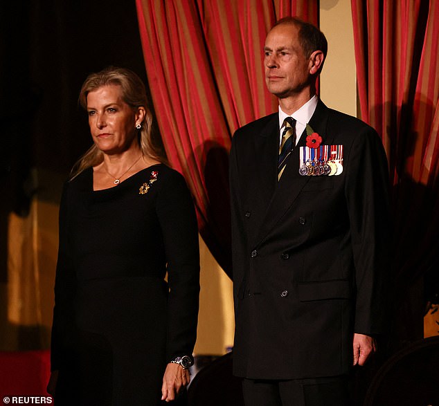 The Duke and Duchess of Edinburgh stand to mark the 80th anniversary of the end of the Second World War