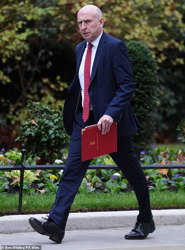Defence Secretary John Healey arriving for a Cabinet meeting in Downing Street yesterday