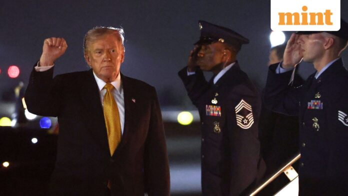 Trump boasts zero illegal aliens released in US in past US President Donald Trump pumps his fist after deboarding Air Force One upon his arrival in West Palm Beach, Florida, US on November 7, 2025.