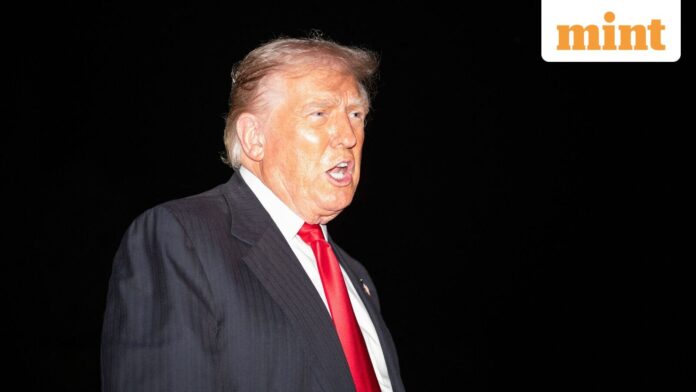 Trump pardons Rudy Giuliani, Mark Meadows, others accused of trying US President Donald Trump speaks to reporters upon his arrival to the White House in Washington, DC, following a trip to Palm Beach, Florida with a stop at a Washington Commanders football game on November 9, 2025.